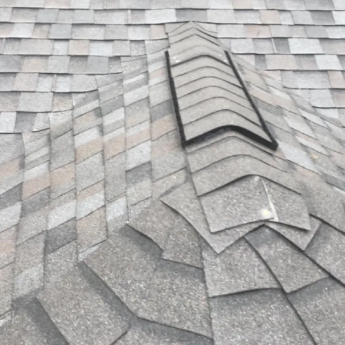 Asphalt roll roofing installation